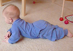 "creeping" to learn to crawl